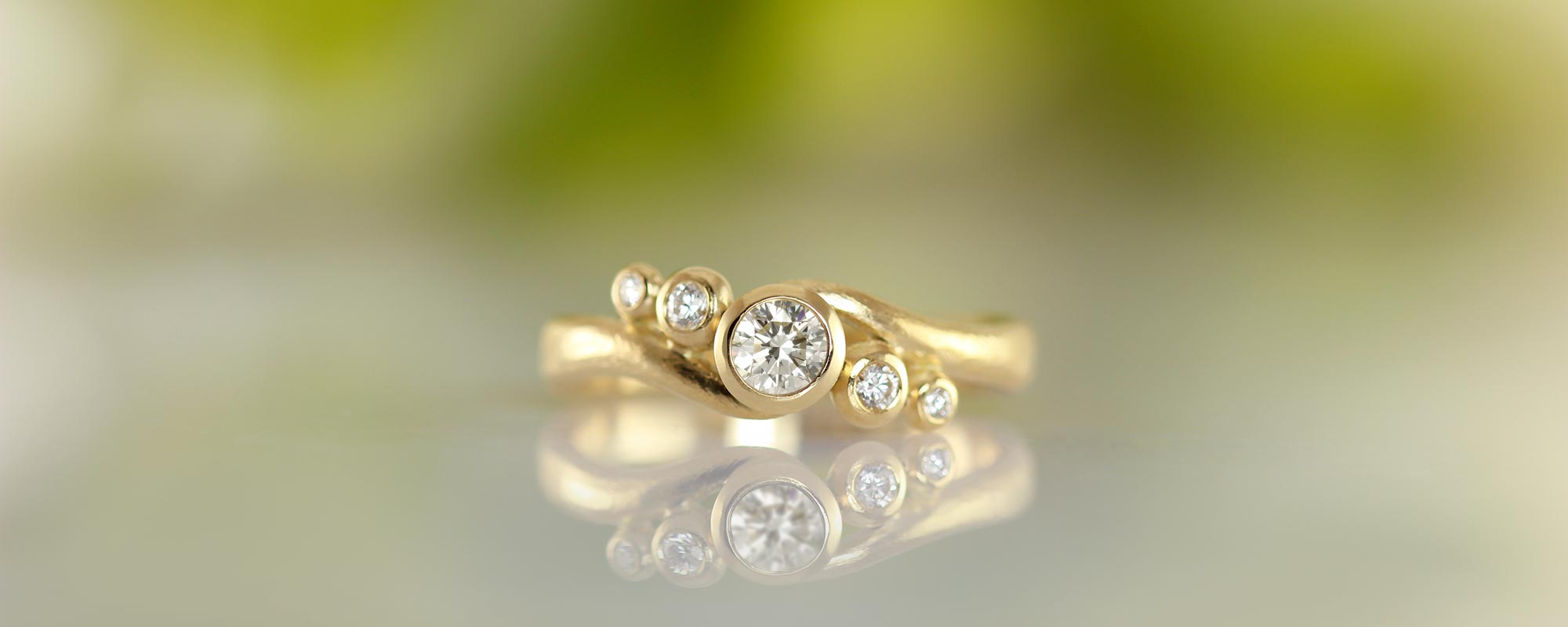 Håndlavede ringe - Unikke smykker hos Castens 5-stens Embrace ring