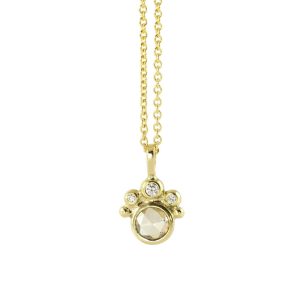 Unique gold pendant with champagne diamond and small white diamonds