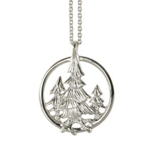 Pendant with pine trees in silver trapped in a circle