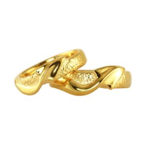 Adventurous gold wedding rings with dragon tails that wrap around your finger