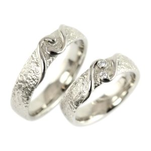 Yin Yang wedding rings in white gold with raw surface