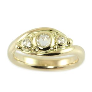 Large gold ring with three rose-cut diamonds