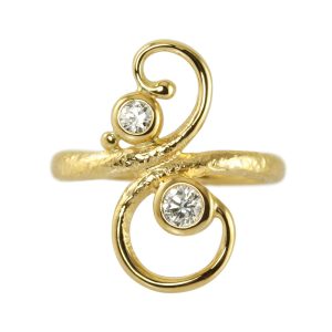 Beautiful twisting ring in gold with two large white diamonds