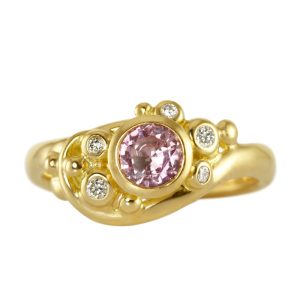 Nereida engagement ring with pink sapphire and sparkling diamonds