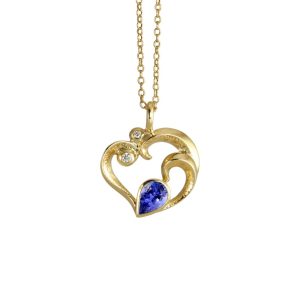 Heart of the sea pendant in gold with blue sapphire and white diamonds