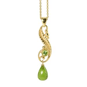 Beautiful swirling pendant in gold with large green peridot